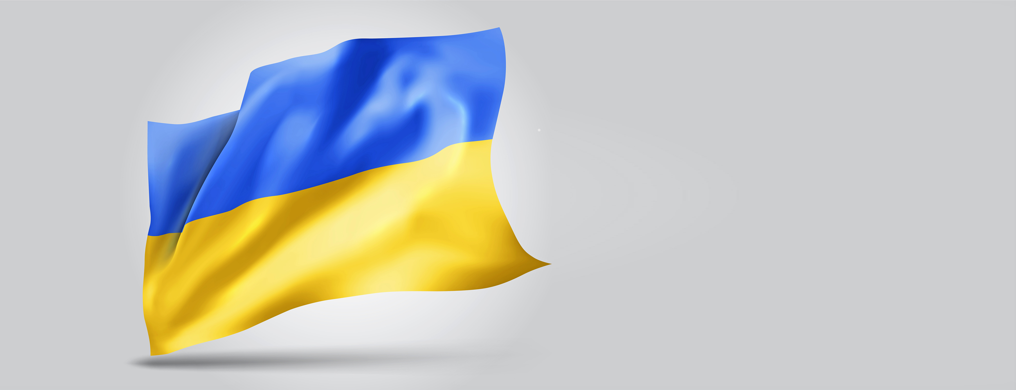 Wehende ukrainische Flagge vor hellgrauem Hintergrund